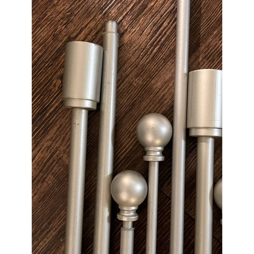 Lot of 11 brushed steel extendable curtain poles various sizes (see description)